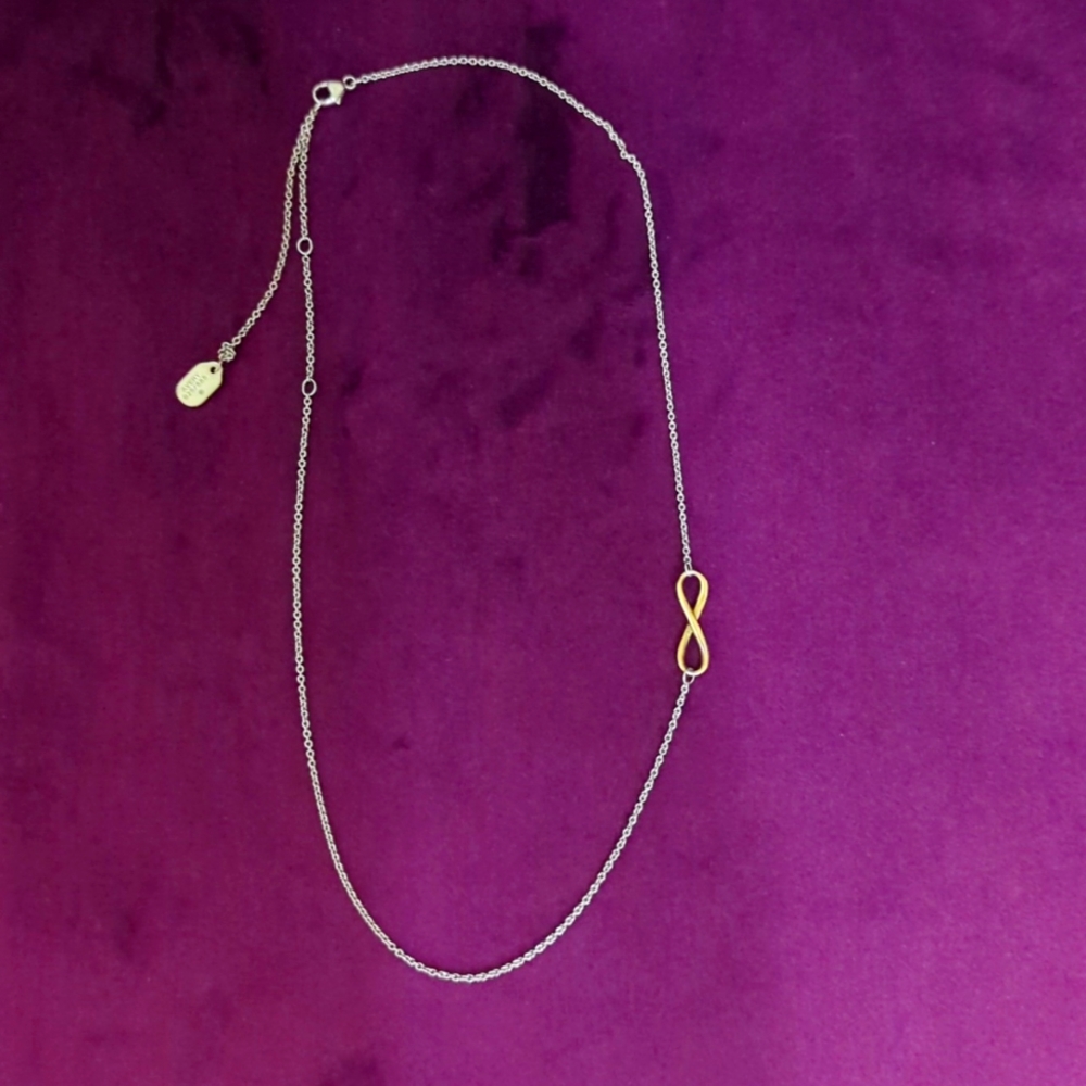 James Avery petite infinity necklace. Sterling silver with gold infinity symbol.